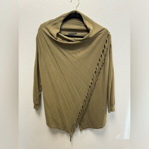 Sweater wrap that buttons on the top of the left shoulder.